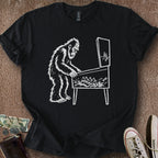 Printify T-Shirt Black / S 0182_bigfoot playing pinball T-Shirt