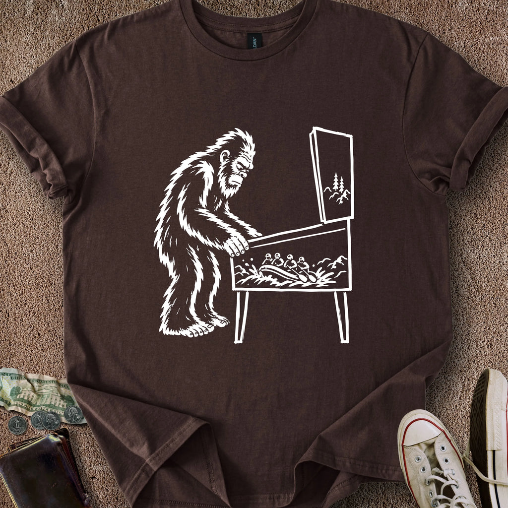 Printify T-Shirt Dark Chocolate / S 0182_bigfoot playing pinball T-Shirt